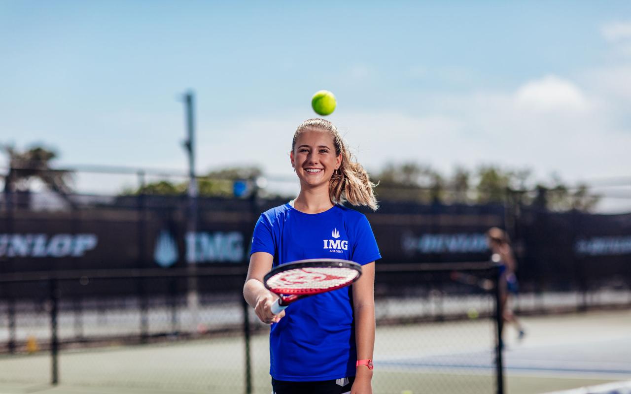 Girl with tennis racket